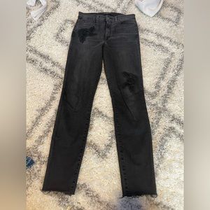 Black skinny jeans with black rose